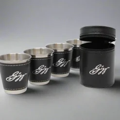 Set of Four Stainless Steel and Leather Shot Glasses